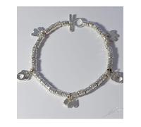 Bracciale a intercalari in argento con sagome pendenti di orme traforate Luce