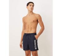 Calvin Klein - Boxer da bagno blu navy scuro con scritta laterale a contrasto 48