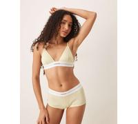 Calvin Klein - Reggiseno a triangolo sfoderato giallo tenue in modal a coste L