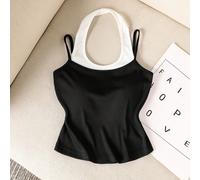 Canotta bicolore nera e bianca in stile 2 in 1 per ragazze pre-adolescenti. È una maglia aderente a maniche corte adatta per le ragazze da indossare in situazioni casual e quotidiane, nonché per uscit