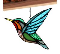 Captivating Hummingbird Detailing: This exquisite ornament highlights a s