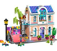 LEGO Friends Casa della Famiglia di Liann - Giocattolo in Miniatura da Costruire con Giardino, 4 Mini Bamboline, Animale Axolotl, Gecko e Accessori - Regalo di Compleanno per Bambine da 7 Anni - 42687
