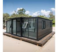 Casa pieghevole economica 2-3 camere da letto con struttura in acciaio da 20-40 piedi, portatile e moderna, perfetta per alloggi temporanei, vita all'aperto e nomadi moderni