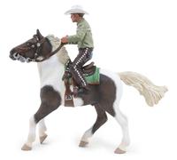 Cavallo con cavaliere cowboy