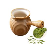 Ceramica, carbone di carbone di carbone di carbone di latte , splendidamente progettato intorno a teiere per tè, bustine di tè, latte e caffè.