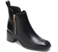 Ces bottines noir, dots d'une fermentation éclair sur le côté Ces bottines noir, punti d'une fermeure éclair sur le côté, allient élegance et praticité. Il loro design raffinato si adatta a diverse to