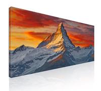 CheQuadro! Quadro montagne al tramonto xxl, sole che illumina la vetta, montagne innevate, nuvole rosse e gialle, Il tramonto illumina le nuvole sulla cima della montagna innevata mow35-120x50 cm