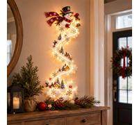 Christmas Magic Trail Wall Light, Luci Natalizie a LED Caldo | Luce da Parete con Treno Natalizio: locomotiva rossa e vagoni seguono una pista curva con bordo effetto neve.