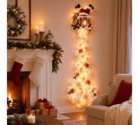 Christmas Magic Trail Wall Light, Luci Natalizie a LED Caldo | Luce da Parete con Treno Natalizio: locomotiva rossa e vagoni seguono una pista curva con bordo effetto neve.