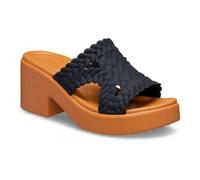 Ciabatte 209979 I sandali Crocs Brooklyn Woven Slide Heel W combinano eleganza moderna e comfort quotidiano. Caratterizzati da una fascia intrecciata effetto tessuto, offrono uno stile raffinato e ver