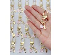 Ciondolo personalizzato a forma di cuore, incisione iniziale e messaggio/lettera d'amore | Portachiavi a forma di cuore | Charm personalizzato per borsa | Regalo, portachiavi, accessori per telefono u