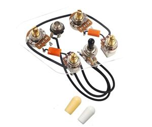 Circuito per chitarra con interruttori push pull che facilitano il passaggio del suono tra le configurazioni del pickup Controllo del tono texture