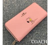 COACH x PEANUTS Portafoglio Lungo Snoopy Woodstock Pelle Zip Rosa Popolare...