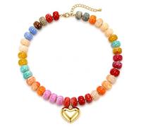 Collana con perline multicolore, con ciondolo a forma di cuore gonfio color | Perline multicolor lucide e distanziatori color oro incorniciano un ciondolo a forma di cuore gonfio su una collana