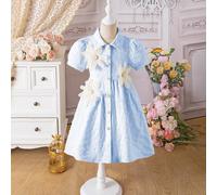 Colletto alla Peter Pan classico + maniche a sbuffo che continuano l'estetica dell'abbigliamento elegante per bambini. Il design delle maniche soffici evidenzia l'eleganza, la raffinatezza e il lusso.