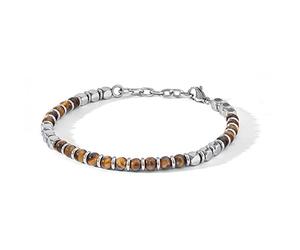 Comete Bracciale da uomo collezione District. Bracciale in acciaio, occhio di tigre. Lunghezza standard a 21 cm, riducibile grazie alla doppia chiusura a 19,5 cm. La referenza è UBR 1104