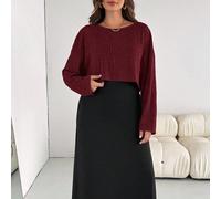 Completo da donna oversize in due pezzi, composto da una maglia a maniche lunghe in tessuto grigio spazzolato casual e comoda, e un lungo gilet nero, adatto per l'autunno e l'inverno, per l'uso quotid