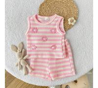 Completo estivo da bambina composto da top a canotta e pantaloncini in jacquard beige e teak, con stile fresco, a tema forestale, pastorale, delicato, semplice e rilassato. Il tessuto presenta una tex