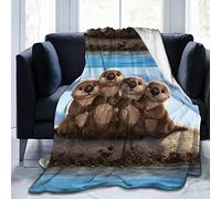 Coperta con simpatiche lontre marine per divano, letto o divano di casa