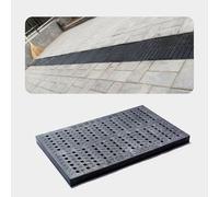 Copertura di scarico in plastica polimerica resistente con design a foro rotondo per una soluzione efficiente di drenaggio del patio e del giardino