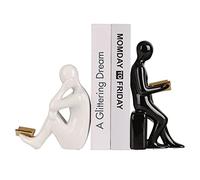 Coppia di statuette decorative in ceramica bianca e nera con libri d'oro a portata di mano per scaffali, statue di decorazione per la casa e sculture di lettura (libro d'oro)