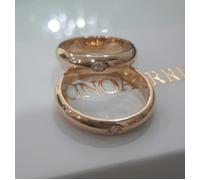 Coppia fedi Unoaerre 10+10 grammi in oro giallo 750 18 kt e diamanti ct 0.05 x 2