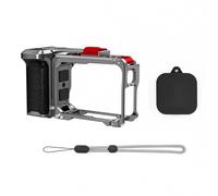 Corpo della fotocamera in alluminio migliora la presa. Doppia compatibilità. Sostituzione rapida della batteria. Gabbia della fotocamera