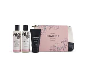 Cowshed Indulge - Set da viaggio per la festa della mamma, set regalo per il bagno e il corpo con lozione per il corpo, gel bagno e doccia e crema per le mani - Floral Spa Essentials con borsa per il