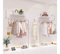 Creativi scaffali di indumento dell'esposizione per i negozi di boutique, soluzione moderna al minuto montata a parete per un'organizzazione efficiente dell'abbigliamento