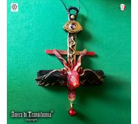 croce crocefisso talismano amuleto pendente capricorno rosso occhio ali serpente