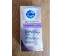 Dentifricio per il sorriso di Hollywood Pearl Drops con ingredienti sbiancant...