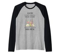 Dio scrive Ancora la Storia Cristiana Inspirational Speranza Fede Maglia con Maniche Raglan