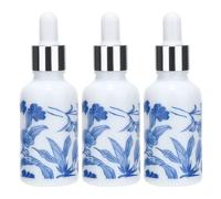 DIYEAH Flaconi Contagocce in Ceramica Bianca e Blu 30ml Set da 3 per Oli Essenziali Aromaterapia da Viaggio Bottiglie di Porcellana Coperchio Pratico e Compatto Colore Colore Casuale