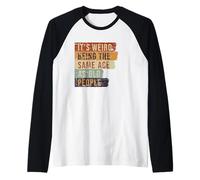 È Strano Avere la Stessa età di Vecchi Che Dicono Persone anziane Divertenti Maglia con Maniche Raglan