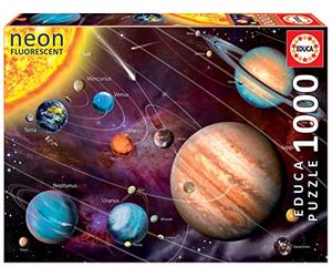 Educa - Puzzle 1000 pezzi Sistema Solare Fluorescente | Puzzle spazio | Misura 68x48 cm | Include colla Fix | Per adulti 14+ (14461)
