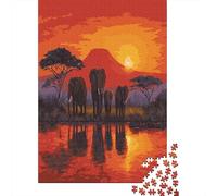 Elefanti in piedi in riva a un fiume di fronte alle montagne africane al tramontoPuzzle 1000 Pezzi Per Adulti, Giochi EduGattoivi38x26cm/1000pcs