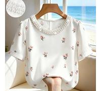 Elegante camicetta da donna taglie forti con collo rotondo, maniche corte e stampa floreale minuta color albicocca, decorazione con catena di perle sul colletto, perfetta per l'estate. Ideale per l'es