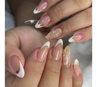 Eleva il tuo senso della moda con questo set da 24 pezzi di unghie finte in acrilico con punta francese bianca e glitter dorati. Il set di unghie finte in acrilico include: 1 pezzo di colla gel e 1 li