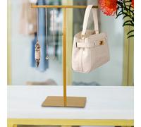 Espositore per borse regolabile in altezza per centro commerciale al