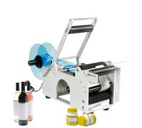 Etichettatrice per bottiglie rotonde, lunghezza dell'etichetta regolabile con controllo a pulsante, adatta a diametri 15-120 mm, ideale per un'etichettatura efficiente dei prodotti