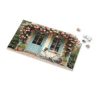 Eurographics - Puzzle da 1000 pezzi, una bicicletta parcheggiata di fronte a una casa incantevole ornata di fiori rosa. Puzzle per adulti, regali di Pasqua per bambini (1000 pezzi)