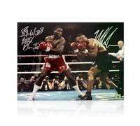 Exclusive Memorabilia Foto di Boxe autografata da Mike Tyson e Frank Bruno.