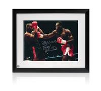 Exclusive Memorabilia Foto di Boxe Firmata da Frank Bruno: Combattimento con McCall. Incorniciata.
