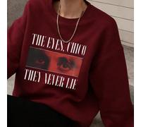 Felpa girocollo da donna taglie forti per l'autunno e l'inverno, realizzata in comodo tessuto di cotone con una stampa unica di "The Eyes, Chico They Never Lie". La caratteristica stampa a forma di oc