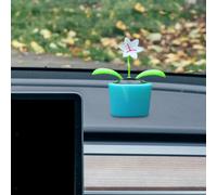 Fiore danzante ad energia solare in vaso colorato che scuote la testa