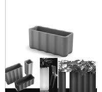 Fioriera NEBULA in Polietilene è un set di vasi con curve sinuoso e forma ondulata Dimensioni 89x35xh 40 cm Colore Ferro ferro