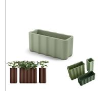 Fioriera NEBULA in Polietilene è un set di vasi con curve sinuoso e forma ondulata Dimensioni 89x35xh 40 cm Colore Giada giada