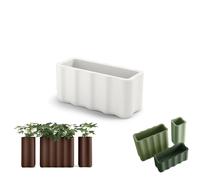 Fioriera NEBULA in Polietilene è un set di vasi con curve sinuoso e forma ondulata Dimensioni 89x35xh 40 cm Colore Perla perla