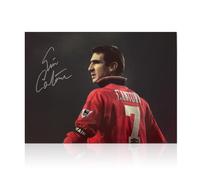 Foto del Manchester United autografata da Eric Cantona