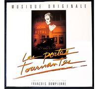 François Dompierre - 1 Disque Vinyle LP 33 Tours - Milan RC.270 - Les Portes Tournantes - Musique : Francois Dompierre : Adieu Val d'amour, Sur le Quai, Just take the train babe, You don't kill a Piano Player, La Fugue, Les Portes Tournantes.